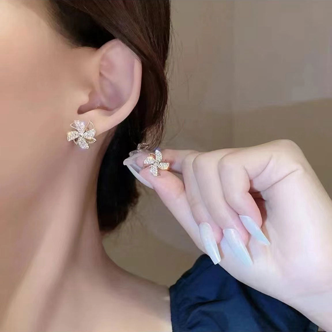 The windmill earrings will rotate.