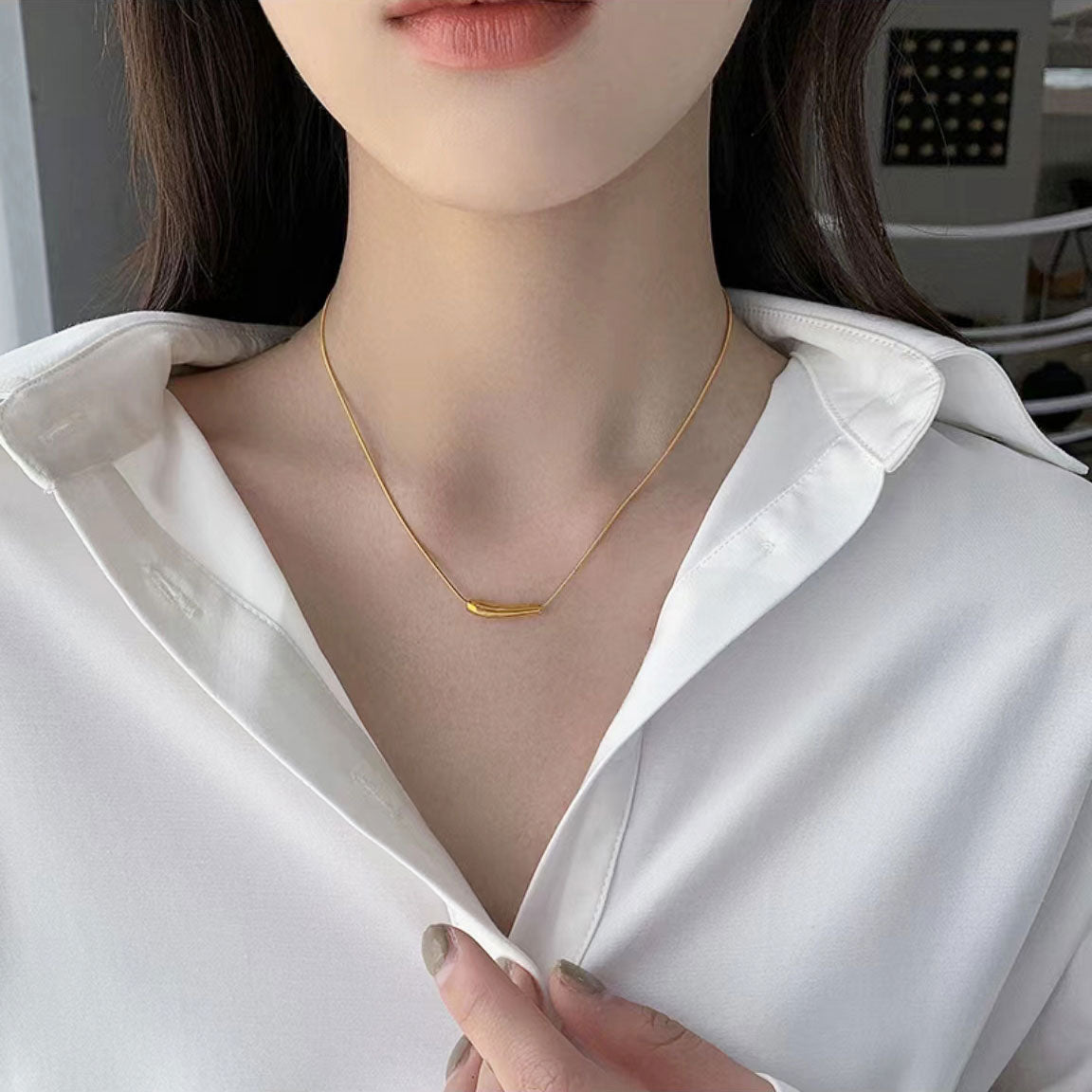 Gold "eggplant" necklace