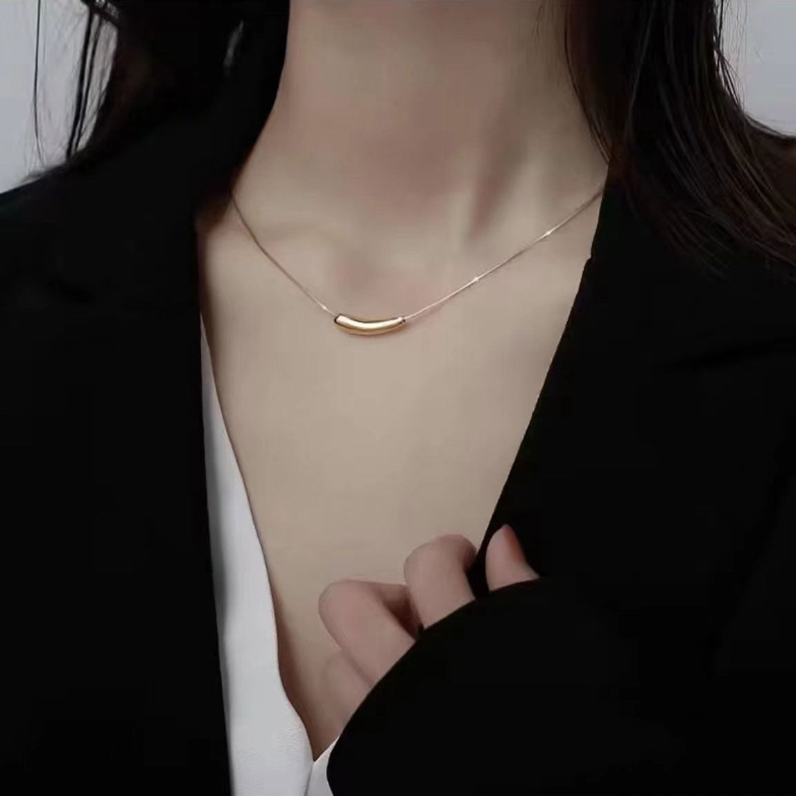 Gold "eggplant" necklace