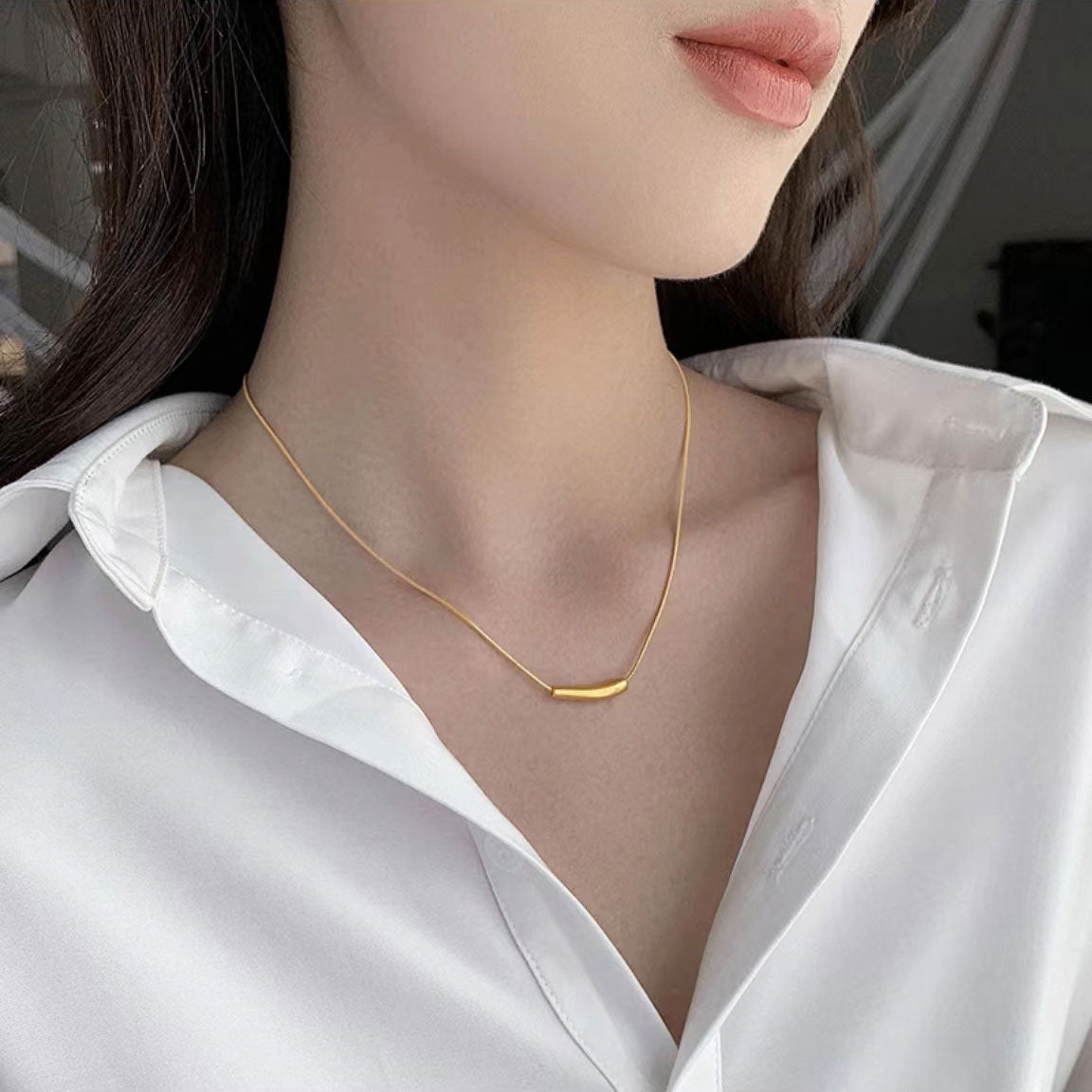 Gold "eggplant" necklace