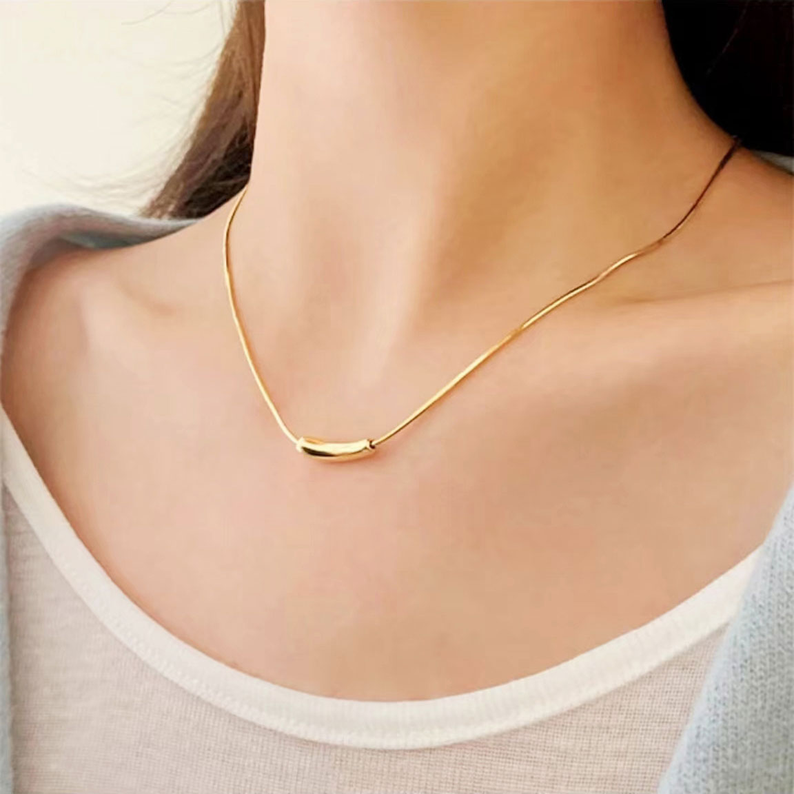 Gold "eggplant" necklace