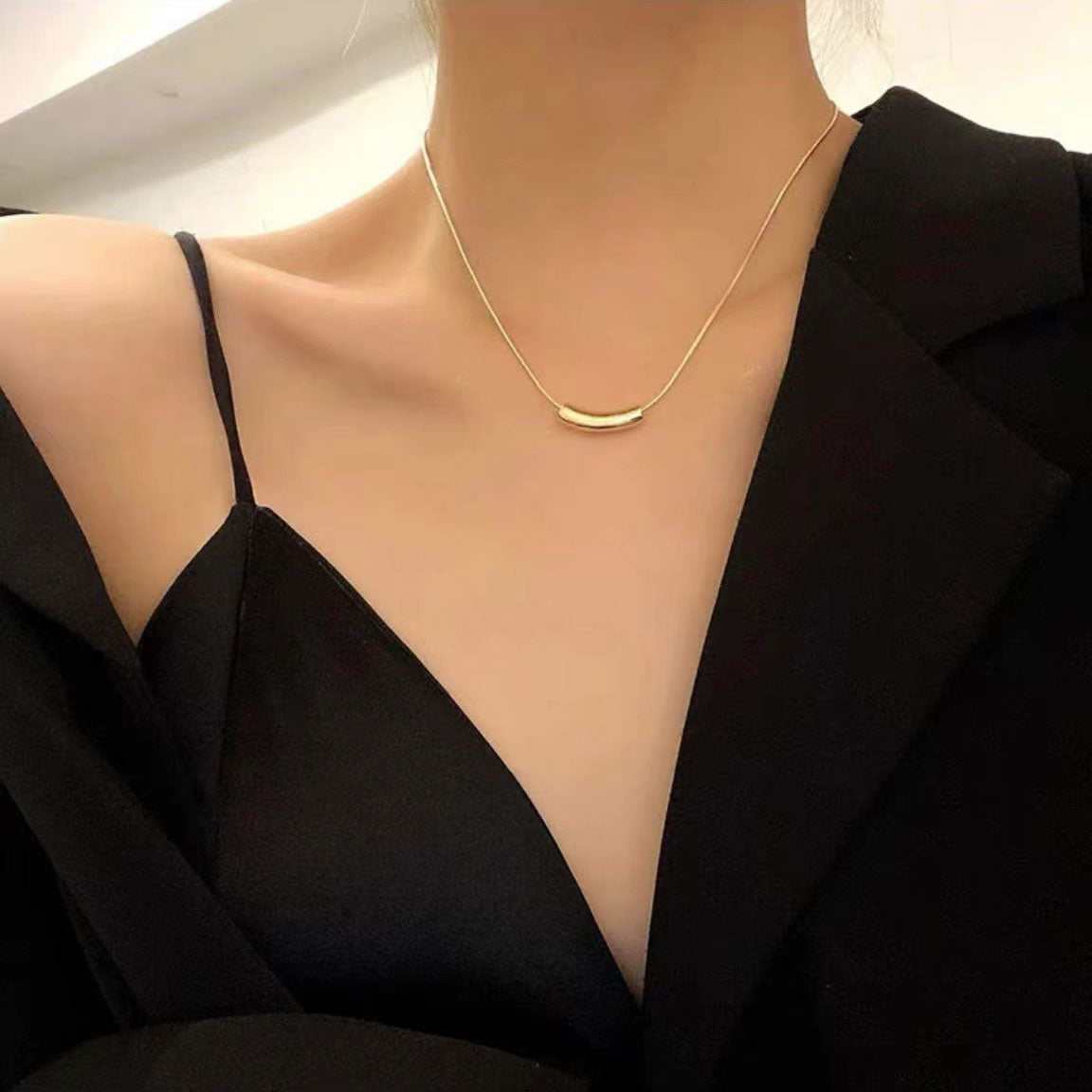 Gold "eggplant" necklace