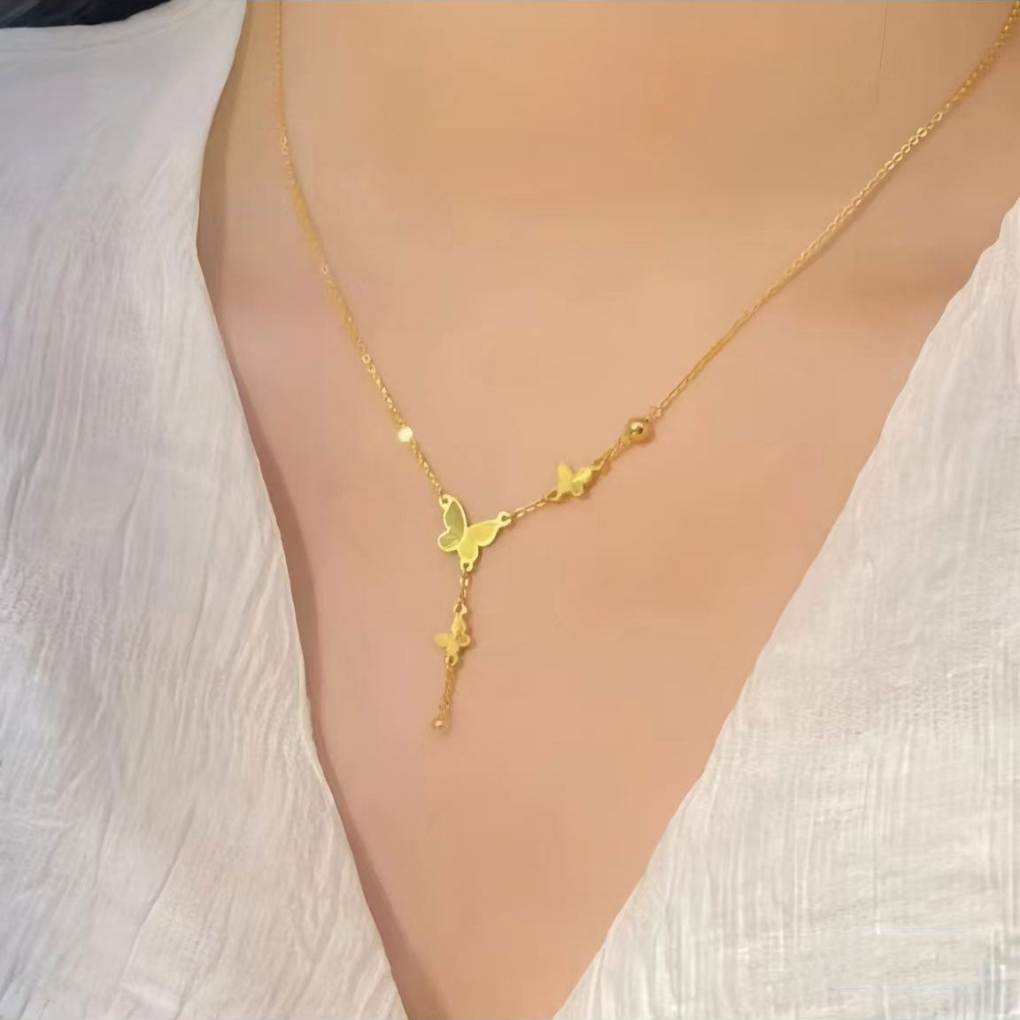 Gold Butterfly Tassel Necklace