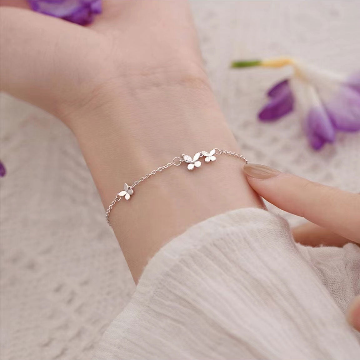 Three butterfly bracelets